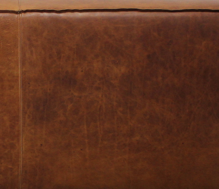 Full Grain, Aniline Leather is not corrected, meaning that scars and natural markings are not corrected or sanded away as with Corrected Top Grain leather